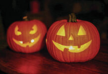 
			
				                                Two smiling Jack-O-Lanterns. <em>(Metro photo)</em>
 
			
		