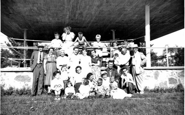 129620717_web1_park-picnic-gang-
This is the old bandstand from the heart of Roosevelt Park in Devils Lake circa 1957. Do you recognize anyone in the picture? Many who are pictured here have passed on, but theres a future editor of the Devils Lake Journal shielding her eyes from the bright sun on the left, shes 70 now. A young Vern Moen is on the far left back row. Hes 75 years old now.