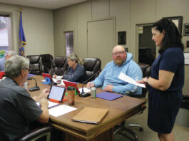 
			
				                                Kim Krogfoss speaks to the Devils Lake School Board at the July 19 7 a.m. meeting.
 
			
		