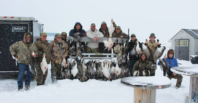 130094272_web1_hunting-gang-
This impressive group of hunters includes Jerry Mueller (St. Charles, MN), Chuck Lindberg (Coon Rapids, MN), Ronnie Lang (Devils Lake, ND), Nick Lindberg (Elk River, MN), Charlie Lindberg (Ramsey, MN), Bob Mueller (Rochester, MN), Jay Evans (Sleepy Eye, MN), Wade Lang (Mankato, MN), Ethan Lindberg (Ramsey, MN), Jonah Lang (Mankato, MN) and down front - Garrett Mueller (Rochester MN) and Adam Wolschlager (Cleveland, MN). Most of these dozen return to Devils Lake and the Lake Region twice each year to fish in the summer and hunt in the fall and winter. The original group has done this for decades and now younger folks have taken the places of some of the older outdoorsmen creating memories for a new generation. They are posing for the Journal at Ronnies hunting lodge at Ackerman Acres. <em>(Photo by Louise Oleson, editor DLJ)</em>