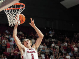 
			
				                                Alabama forward Grant Nelson (2) gets to the basket between Morehead State guard Eddie Ricks III (4) and guard Riley Minix (22) during the second half of an NCAA college basketball game, Monday, Nov. 6, 2023, in Tuscaloosa, Ala. <em>(AP Photo/Vasha Hunt) </em>
 
			
		