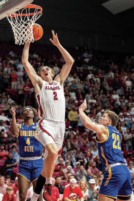 130134907_web1_AP23311128136382_2_cmyk
Alabama forward Grant Nelson (2) gets to the basket between Morehead State guard Eddie Ricks III (4) and guard Riley Minix (22) during the second half of an NCAA college basketball game, Monday, Nov. 6, 2023, in Tuscaloosa, Ala. <em>(AP Photo/Vasha Hunt) </em>