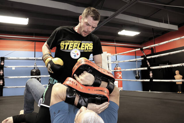 130305802_web1_justinlik_cmyk
Justin Likness prepares for his fight at Spirit Lake Casino by practicing ground-and-pound striking. (Photo by Andrew Benjamin - DLJ Reporter)