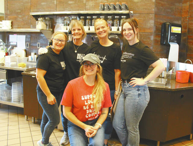 130897710_web1_Bully-Brew-OPEN
Sandi Luck, founder and CEO of Bully Brew Coffee - shown here in the back row 3rd from the left - was in Devils Lake all last week and Monday, Sep. 9 working with her amazing local crew at the newest coffeeshop in the city. The 9th Bully Brew in the region! Monday was opening day of the newest company featured in City Plaza. Where can you find it? Bully Brew replaces Dunn Brothers Coffee and although theyre making a few alterations, they are open and ready to serve you inside or at the drive up window. (photo by Louise Oleson)