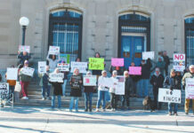 
			
				                                At 10 a.m. on Saturday, April 19, 2025, people from around the Lake Region started to gather in front of the Old Post Office, the former Federal Building, and Lake Region Heritage Center for a second “Hands Off” protest.
 
			
		