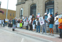 
			
				                                They started gathering at 10 a.m. and by 11:30 a.m. over 80 people had exercised their right to free speach and peaceful assembly guaranteed in the First Amendment of the Constitution of the USA at Devils Lake’s “No Kings” rally on the steps of the Lake Region Heritage Center, main street. Using a microphone and small speaker participants were invited to come forward and tell the crowd why they had come to this event. Although a few passersby expressed their opinions in opposition to the rally, many attending the rally did step up and express their concerns. Across the U.S. over 5 million people participated in the “No Kings” rally, estimated to be the largest demonstration in US history.
 
			
		