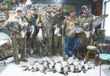 Four generations of Minnesota outdoorsmen visit Lake Region twice each year
Devils Lake resident Ronnie Lang (far left) and his friends - four generations of fishermen and hunters - who visit the Lake Region twice each year. They all love to fish Devils Lake in the summertime staying at a campground in Grahams Island State Park. Shown here they also come each fall to get their limit of Canada goose, speckled belly geese, pheasants, ducks like widgons, red heads, mallards and gadwells. Although Bob and Garrett Mueller (Rochester, MN) had to leave early to get back to work, bringing their birds home with them, Charlie Lindberg (Ramsey, MN), Ethan Lindberg (Ramsey, MN), Nick Lindberg (Ham Lake, MN), Chuck Lindberg (Coon Rapids, MN) and Chris Lindberg (Andover, MN) stayed to pose for the Devils Lake Journal to photograph them and their birds. The hunters said they always enjoy their time in the Lake Region and are grateful for all the landowners who allow them to hunt on their land. They will be back next year fishing in the summer and hunting in the fall with their friend, Ron.