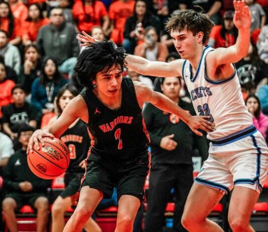 
			
				                                Warwick’s Anthony Touche competes in the 2025 Region 2 boys’ basketball tournament in Devils Lake. (Photo by Noah Clooten)
 
			
		