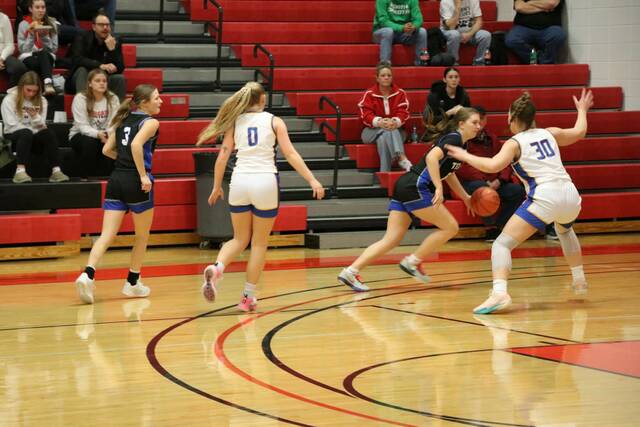 131980406_web1_benson-county-girls-basketball-12-5-25
Photo by Mojo Hill