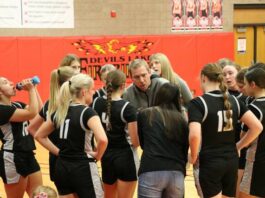 
			
				                                Nelson County girls basketball coach Gus Kueber gives his team a pep talk during the 2025 Lake Region Invitational in Devils Lake. (Photo by Mojo Hill)
 
			
		