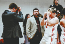 
			
				                                Mason Palmer is introduced in the starting lineup. (Photo by Cameron Carlson)
 
			
		