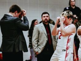 
			
				                                Mason Palmer is introduced in the starting lineup. (Photo by Cameron Carlson)
 
			
		