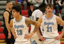Buzzer-beating layup sinks LRSC men’s basketball in near-comeback against Bottineau
Dalen Leftbear (23) and Dane Hagler (21) take a breather in between plays. (Photo by Mojo Hill)