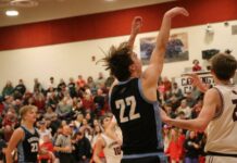 
			
				                                Easton Benz reacts while the other players on the floor watch his three-point attempt. (Photo by Mojo Hill)
 
			
		