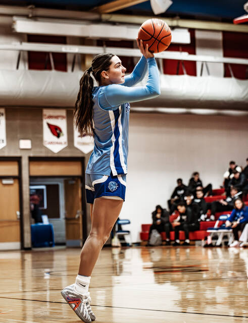 <p>Jenna Tierney attempts a long-range shot. (Photo by Cameron Carlson)</p>