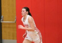 
			
				                                Devils Lakes Mia Elsperger runs down the court during the Firebirds region win over May-Port-C-G. (Photo by Mojo Hill)
 
			
		