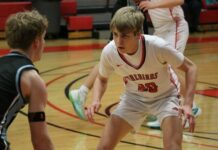 
			
				                                Alex Hammond locks in while guarding a Valley City players in the Firebirds win on Thursday, Jan. 29. (Photo by Mojo Hill)
 
			
		