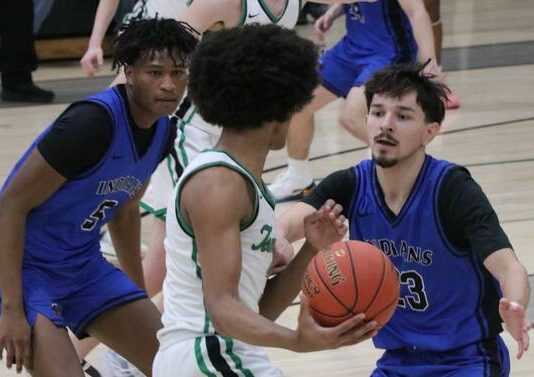 
			
				                                Marial Deng and Tyler Black Jr. lock in defensively for the Indians.
 
			
		