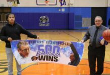
			
				                                Rick Smith poses with a special 500 wins banner. (Photo by Mojo Hill)
 
			
		