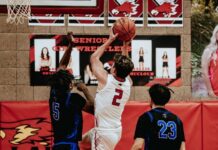 
			
				                                Mason Palmer drives to the rim in Devils Lakes game on Tuesday against No. 1 Four Winds/Minnewaukan. (Photo by Cameron Carlson)
 
			
		