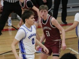 
			
				                                Joran Lohnes backpedals while watching the ball during Four Winds/Minnewaukans win over Carrington on Thursday. (Photo by Mojo Hill)
 
			
		