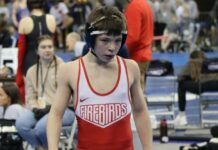 Three Devils Lake boys make state wrestling quarterfinals; seven others stay alive
Freshman Gregor Samuelson went neck-and-neck with the No. 2 seed in his weight class on Thursday at the Fargodome. (Photo by Mojo Hill)
