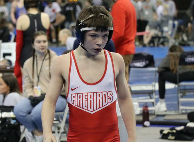 Freshman Gregor Samuelson went neck-and-neck with the No. 2 seed in his weight class on Thursday at the Fargodome. (Photo by Mojo Hill)