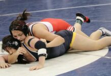 
			
				                                Jaylee Jetty takes her opponent down during in the state wrestling tournament on Friday, Feb. 20. (Photo by Mojo Hill)
 
			
		