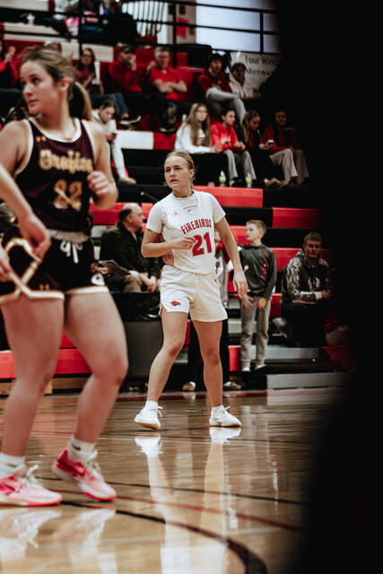 132156068_web1_Girls-Tourney-ball-3
Presley Brown scored 19 for Devils Lake in a quarterfinal win over Grafton on Monday. (Photo by Cameron Carlson)