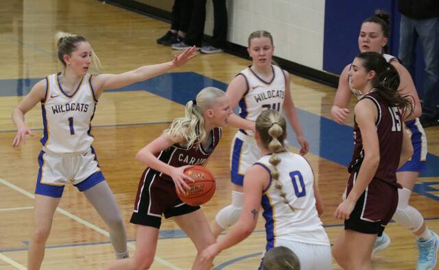 132162149_web1_benson-county-langdon-girls-basketball-2-25-26
Langdon Area/Munichs Mya Swanson drives into the lane, past the outstretched hand of Benson Countys Addisyn Faul, in the 2025-26 District 4 championship. (Photo by Mojo Hill)