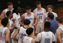 
			
				                                The LRSC mens basketball team meets for a timeout during a game at North Star Public School in Cando. (Photo by Mojo Hill)
 
			
		
