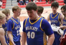 
			
				                                Benson Countys Grant Haagenson returns to the bench during Benson Countys win over North Prairie in the district tournament at Langdon Area High School. (Photo by Mojo Hill)
 
			
		