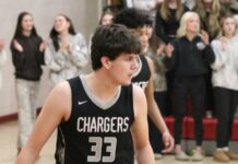 
			
				                                Jaxson Joramo gets ready to play defense for Nelson County in a District 4 semifinal game at Langdon Area High School. (Photo by Mojo Hill)
 
			
		