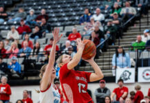 
			
				                                Tylie Brodina attempts to get a shot up past Valley Citys Dacota Potratz. (Photo by Cameron Carlson)
 
			
		