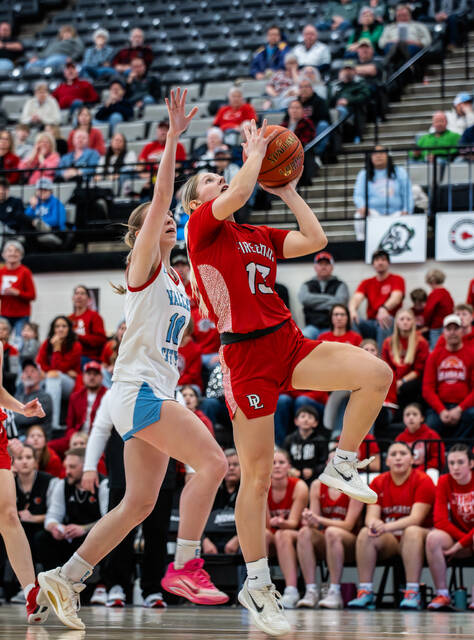 Tylie Brodina attempts to get a shot up past Valley Citys Dacota Potratz. (Photo by Cameron Carlson)