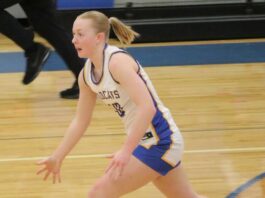 
			
				                                Benson Countys Aubrey Kenner hurries down the court in a game at Maddock High School. (Photo by Mojo Hill)
 
			
		