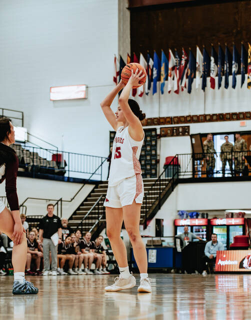 Mia Elsperger looks for an open pass. (Photo by Cameron Carlson)