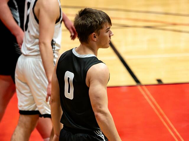 Nelson County guard Brody Rainsberry looks on during the Chargers region quarterfinal win over Drayton/Valley-Edinburg on Monday. (Photo by Cameron Carlson)