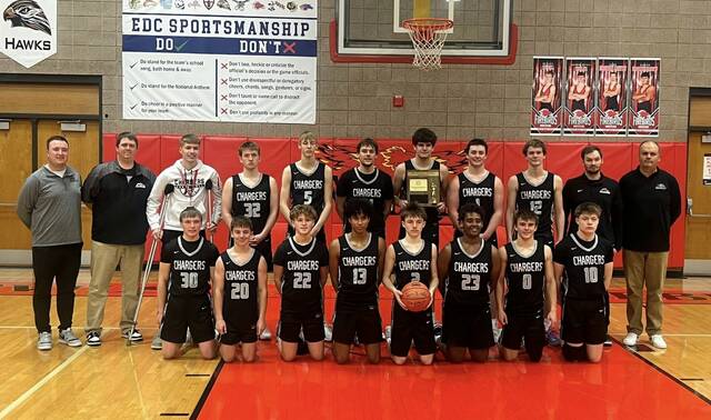The Nelson County boys basketball team poses after taking second in the Region 2B tournament at the Devils Lake Sports Center. (Photo via Chargers Nation on Facebook)
