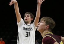 
			
				                                Rider Schmidt shoots a free throw for Nelson County on Saturday in the Chargers state qualifier game against Linton/HMB. (Photo by Mojo Hill)
 
			
		