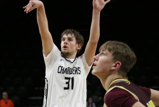 Rider Schmidt shoots a free throw for Nelson County on Saturday in the Chargers state qualifier game against Linton/HMB. (Photo by Mojo Hill)