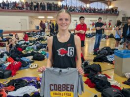 
			
				                                Devils Lake junior Sara Kraft poses after setting a school indoor record in the long jump at the Cobber Indoor. (Photo via Devils Lake Firebirds Track and Field on Facebook)
 
			
		