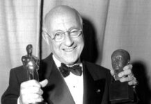 
			
				                                Cecil B. De Mille poses in Los Angeles on March 19, 1953 at the 25th annual Academy Awards. He holds his Oscar for best picture, The Greatest Show on Earth, and the Irving G. Thalberg Memorial Award for consistently high production achievement. The 1953 Academy Awards were the first televised awards ceremony.
                                 AP PHOTO/STF

			
		