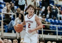 
			
				                                Mason Palmer corrals the ball during Devils Lakes state quarterfinal game against Dunseith at the Fargodome. (Photo by Cameron Carlson)
 
			
		