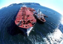 
			
				                                In this April 4, 1989 file photo, the grounded tanker Exxon Valdez (left) unloads oil onto a smaller tanker, San Francisco, as efforts to re-float the ship continue on Prince William Sound, 25 miles from Valdez, Alaska. The 987-foot tanker, carrying 53 million gallons of crude, struck Bligh Reef at 12:04 a.m. on March 24, 1989, and within hours unleashed an estimated 10.8 million gallons of thick, toxic crude oil into the water. Storms and currents then smeared it over 1,300 miles of shoreline. Thirty-seven years later, the region, people and wildlife are still recovering.
                                 AP Photo, File

			
		