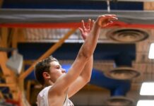 
			
				                                Ben Brodina follows through on a long-range shot. (Photo by Cameron Carlson)
 
			
		