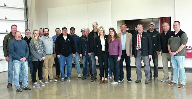 Fedorchak poses with farmers and ranchers who attended the ag roundtable meeting held on Tuesday, March 31 at High Plains Equipment.
Photo by Mark C. Robinson