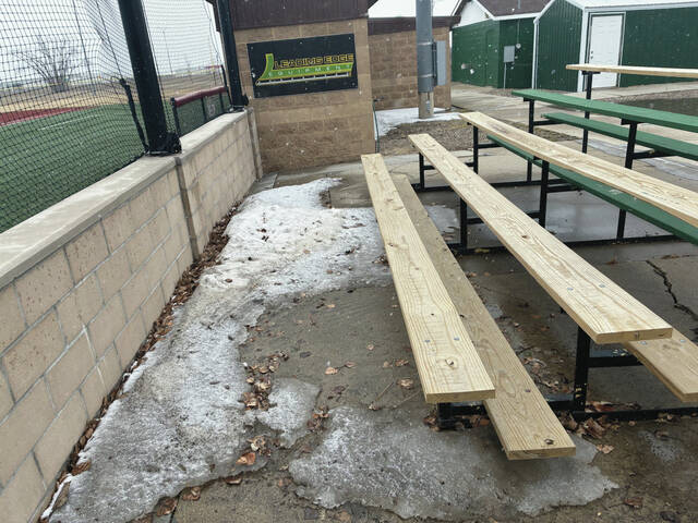 A few traces of snow remain near the bleachers.
                                 Photo by Mojo Hill