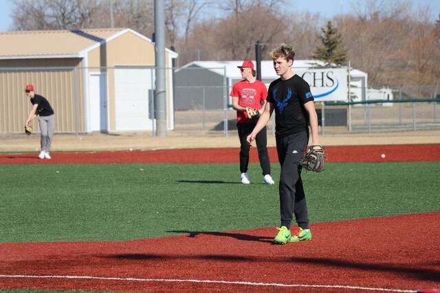 Infielder Max Palmer resets between reps.
                                 Photo by Mojo Hill