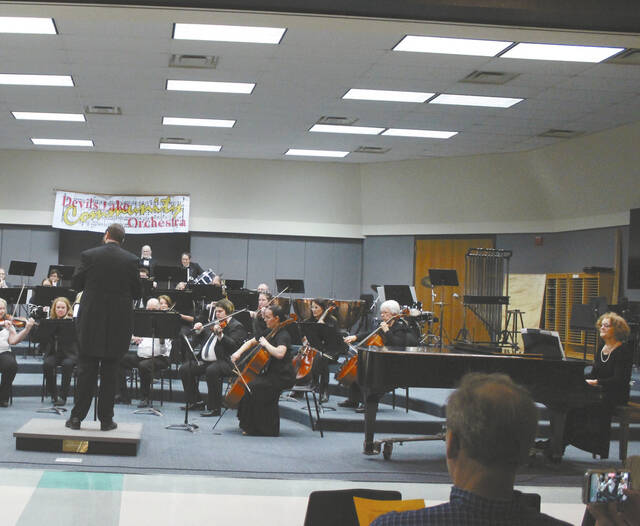 Kitty Overbo sits at the Steinway piano, far right, in this photo from one of the recent Devils Lake Community Orchestra concerts.
Photo by Louise Oleson, Editor Emeritus
